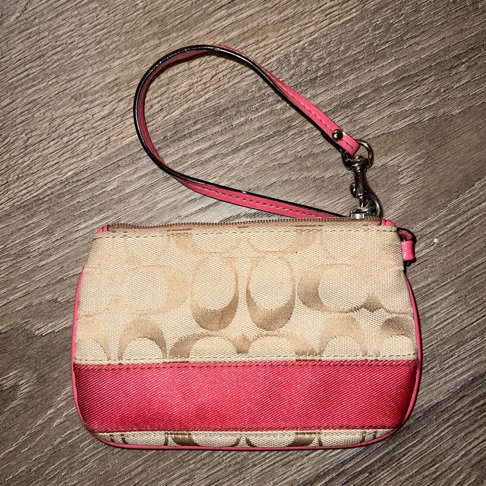 Coach Wristlet. Tan & peach. Good condition.